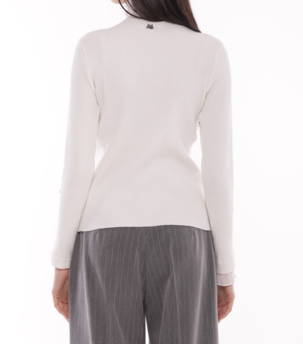 Jersey de cuello alto con de cuello alto con rizos en mangas y muñeca